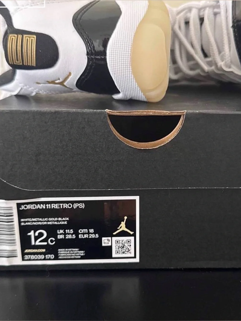 Jordan Kids Retro 11 Sneakers in White, Black & Gold